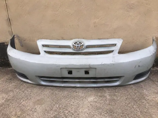 Silver Toyota NZE 2003 front bumper for sale